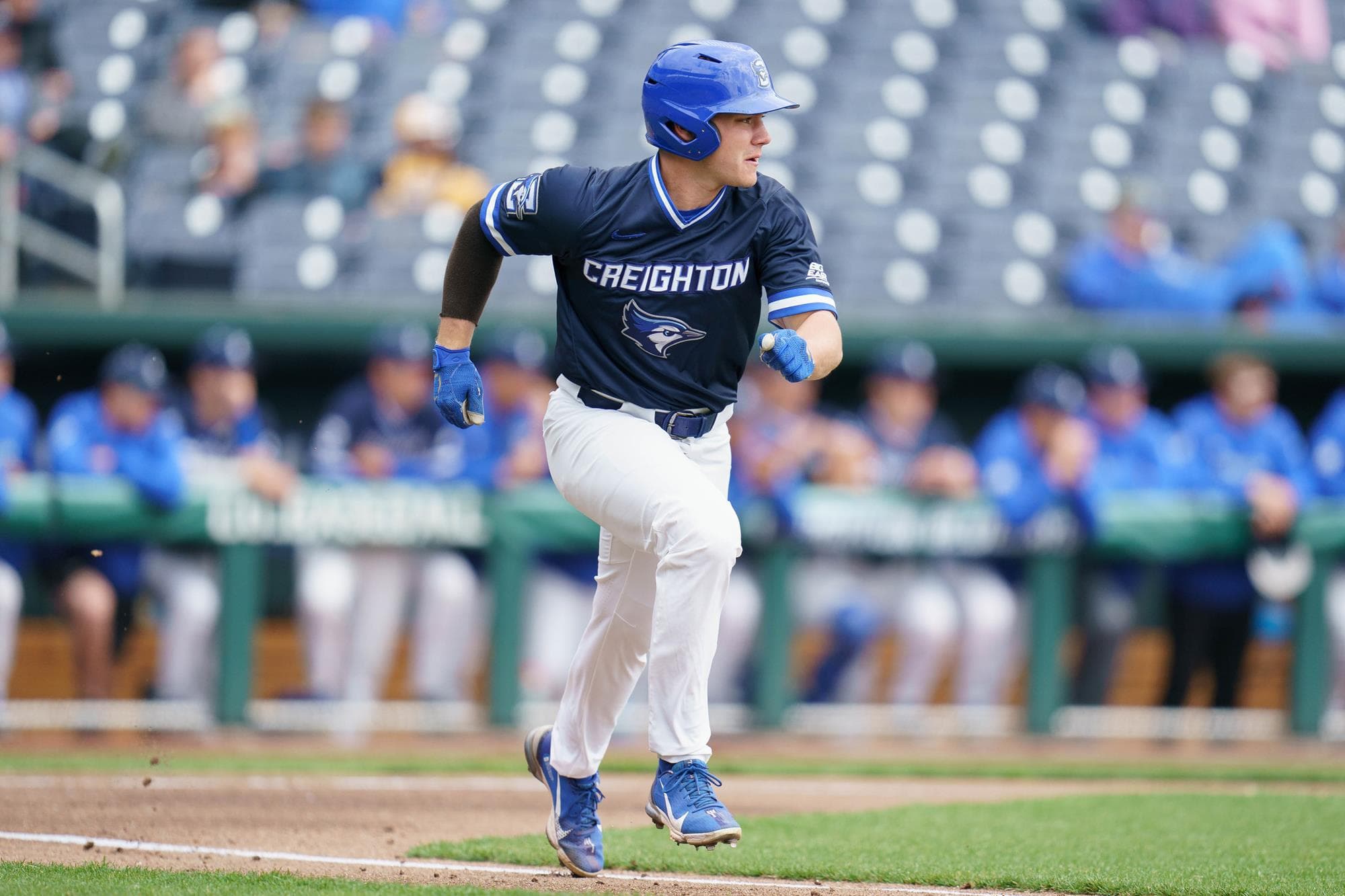 Dunedin Blue Jays outfielder Robert Robertis (13) takes the field