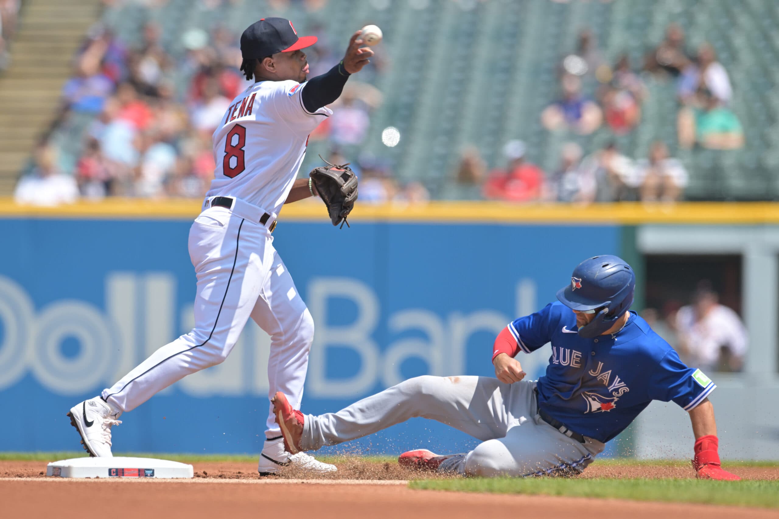 Toronto Blue Jays' Davis Schneider watches his RBI double off