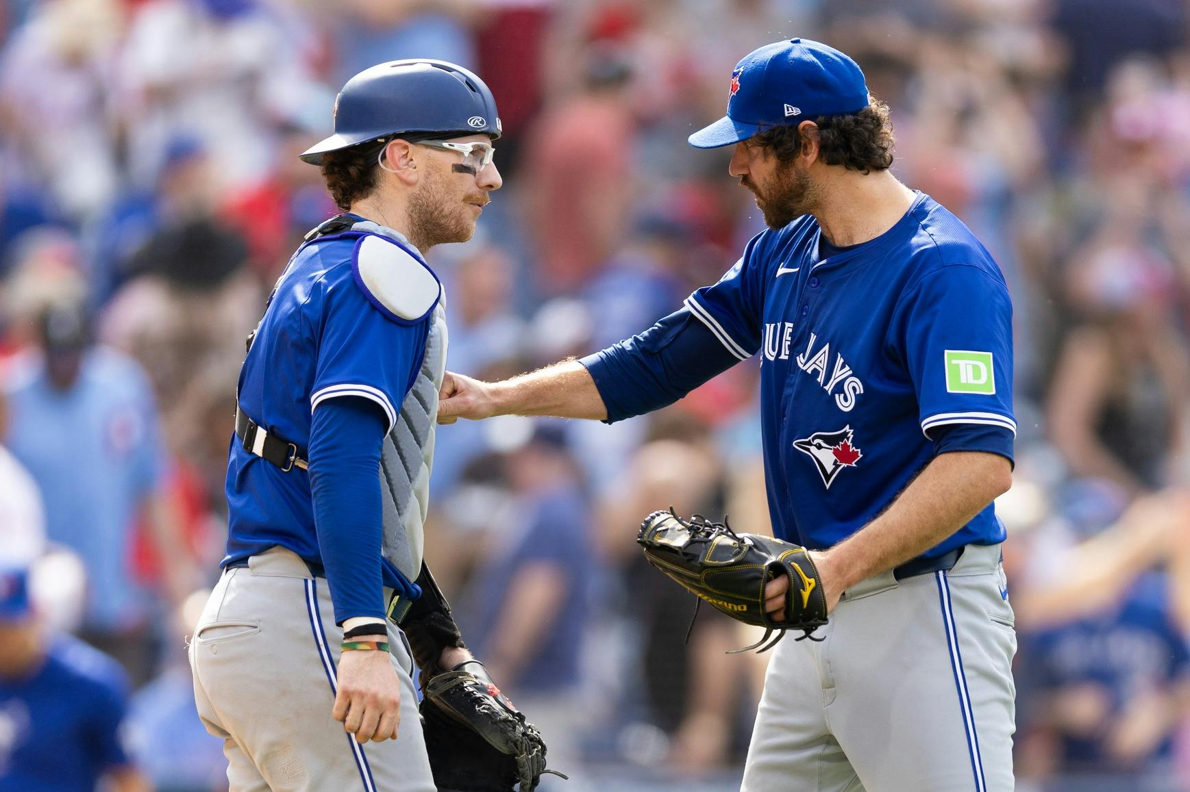 Toronto Blue Jays pitcher Jordan Romano (68) and catcher Danny Jansen (9) react to a victory against the Philadelphia Phillies at Citizens Bank Park. Mandatory Credit: Bill Streicher-USA TODAY Sports