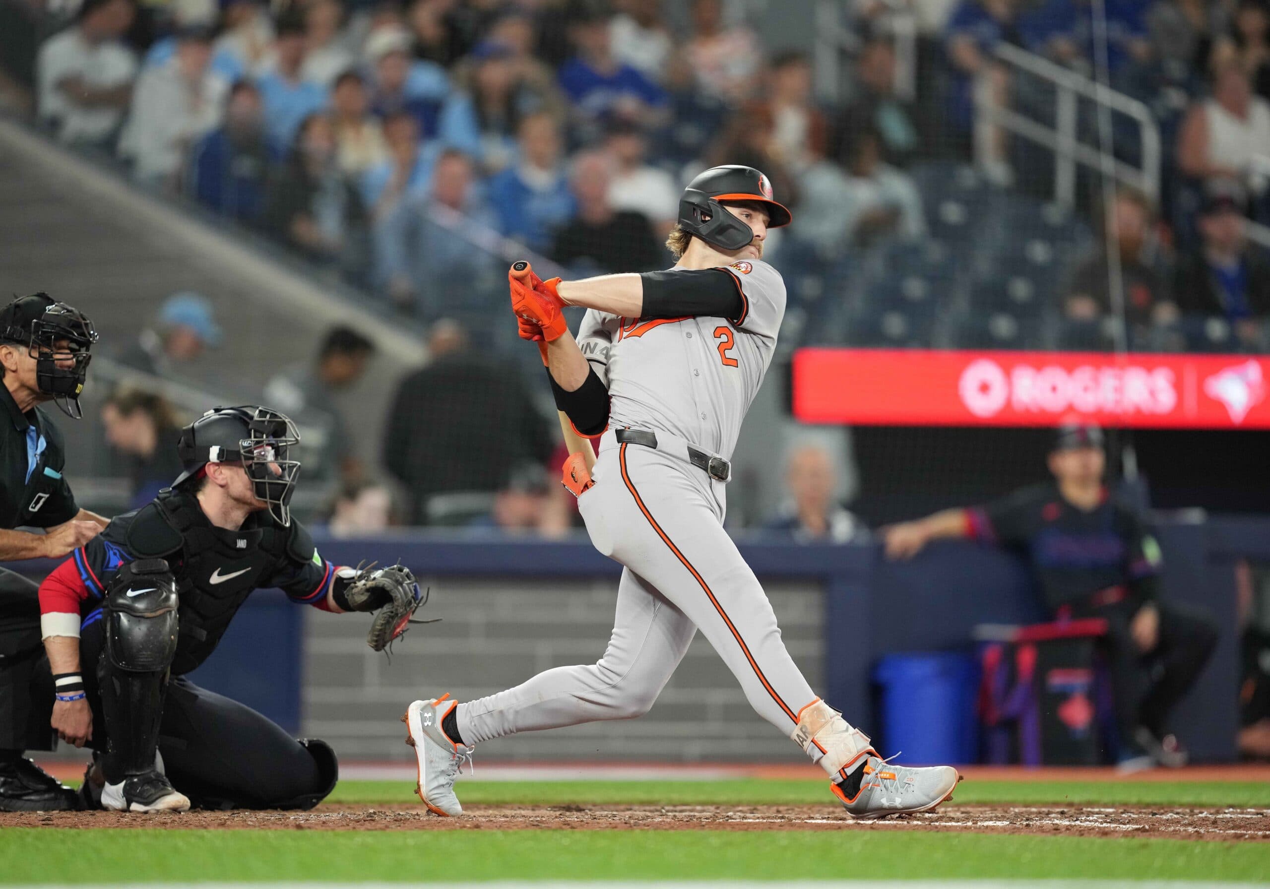 Baltimore Orioles shortstop Gunnar Henderson (2) hits a double against the Toronto Blue Jays during the ninth inning at Rogers Centre.