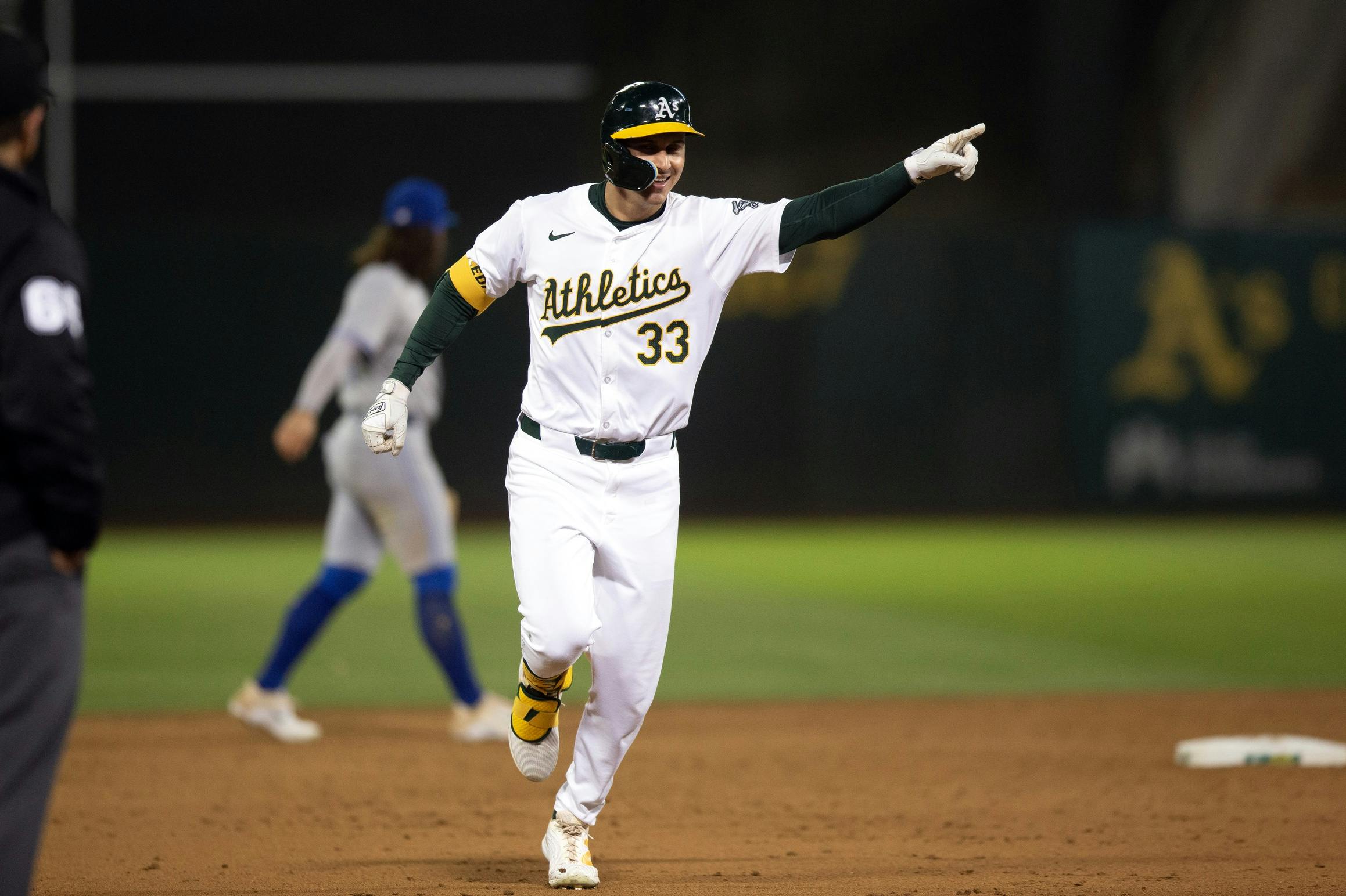Oakland Athletics center fielder JJ Bleday (33) celebrates his game-winning home run against the Toronto Blue Jays during the ninth inning at Oakland-Alameda County Coliseum.
