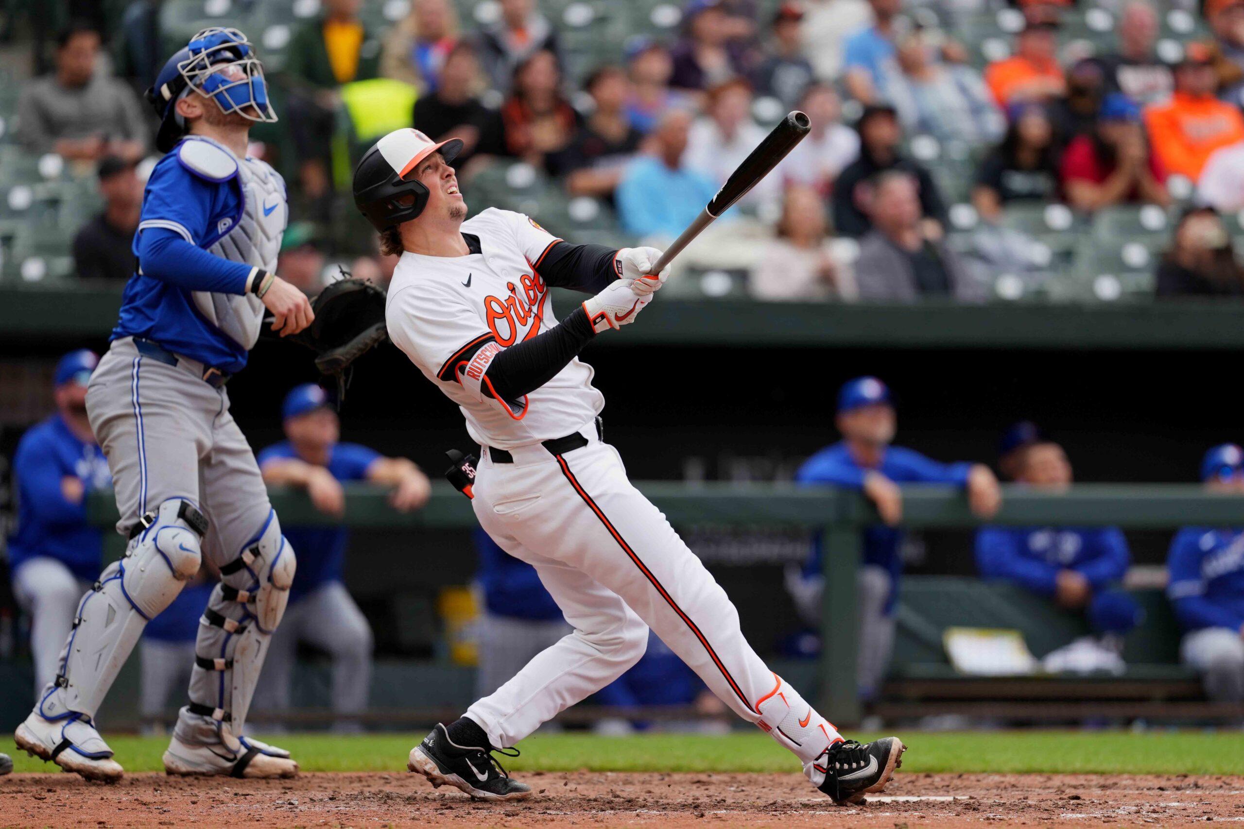 Baltimore Orioles designated hitter Adley Rutschman (35) connects on a game winning, two-run home run against the Toronto Blue Jays in the ninth inning at Oriole Park at Camden Yards.