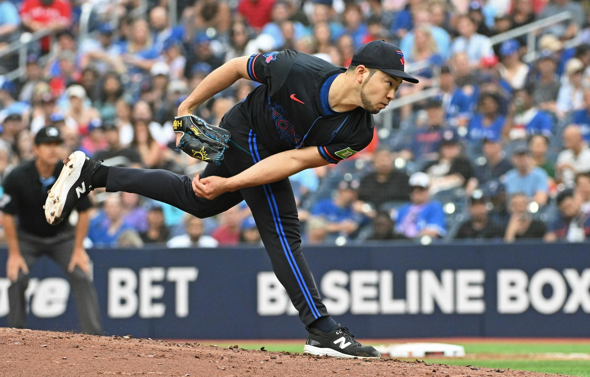 Toronto Blue Jays pitcher Yusei Kikuchi (16) pitches in the second inning against the Houston Astros at Rogers Centre.