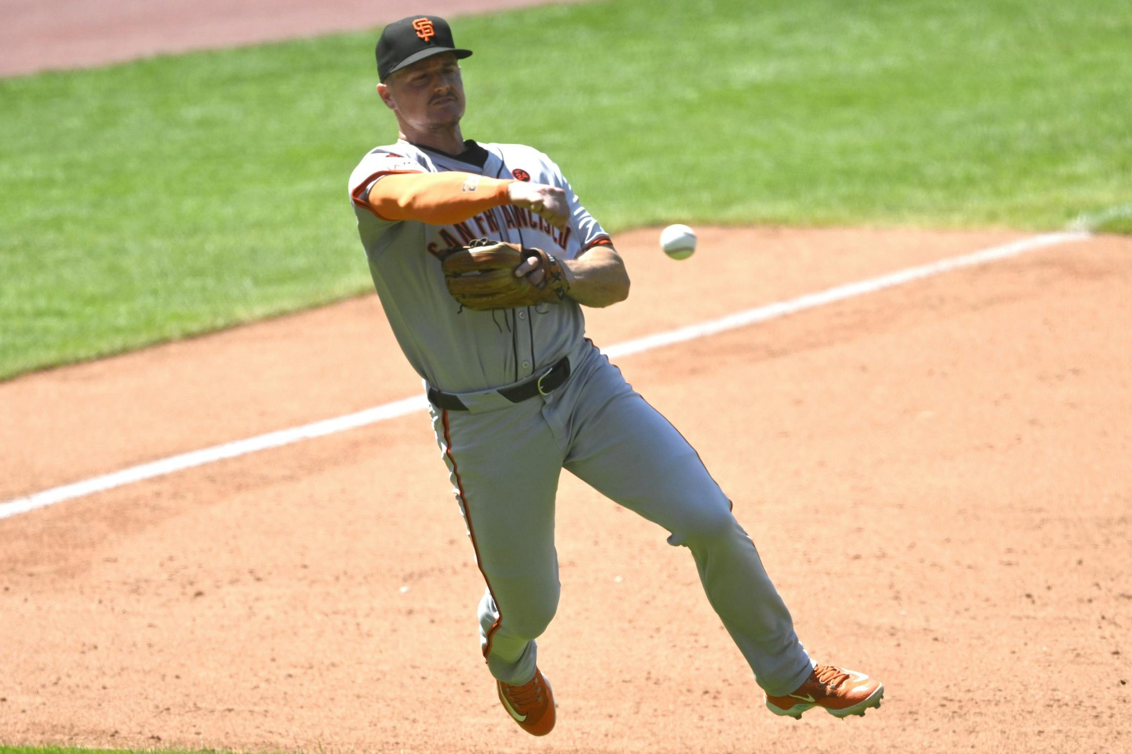 San Francisco Giants third baseman Matt Chapman (26) throws to first base in the sixth inning against the Cleveland Guardians at Progressive Field.