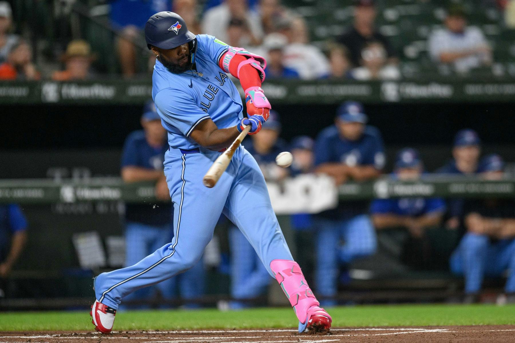 Toronto Blue Jays first base Vladimir Guerrero Jr. (27) hits a double during the first inning against the Baltimore Orioles at Oriole Park at Camden Yards.