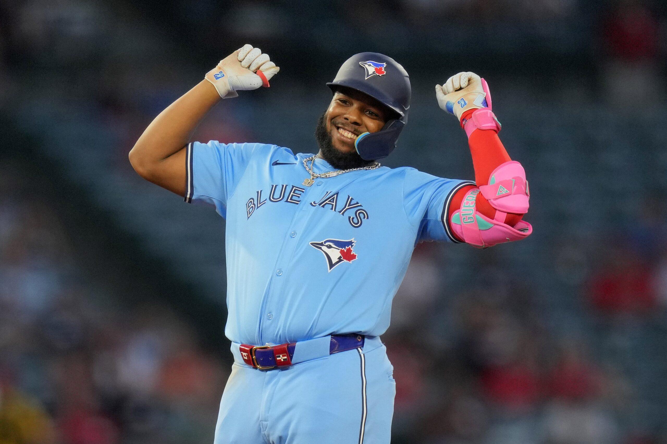 Toronto Blue Jays first baseman Vladimir Guerrero Jr. (27) celebrates after hitting a double in the fifth inning against the Los Angeles Angels at Angel Stadium