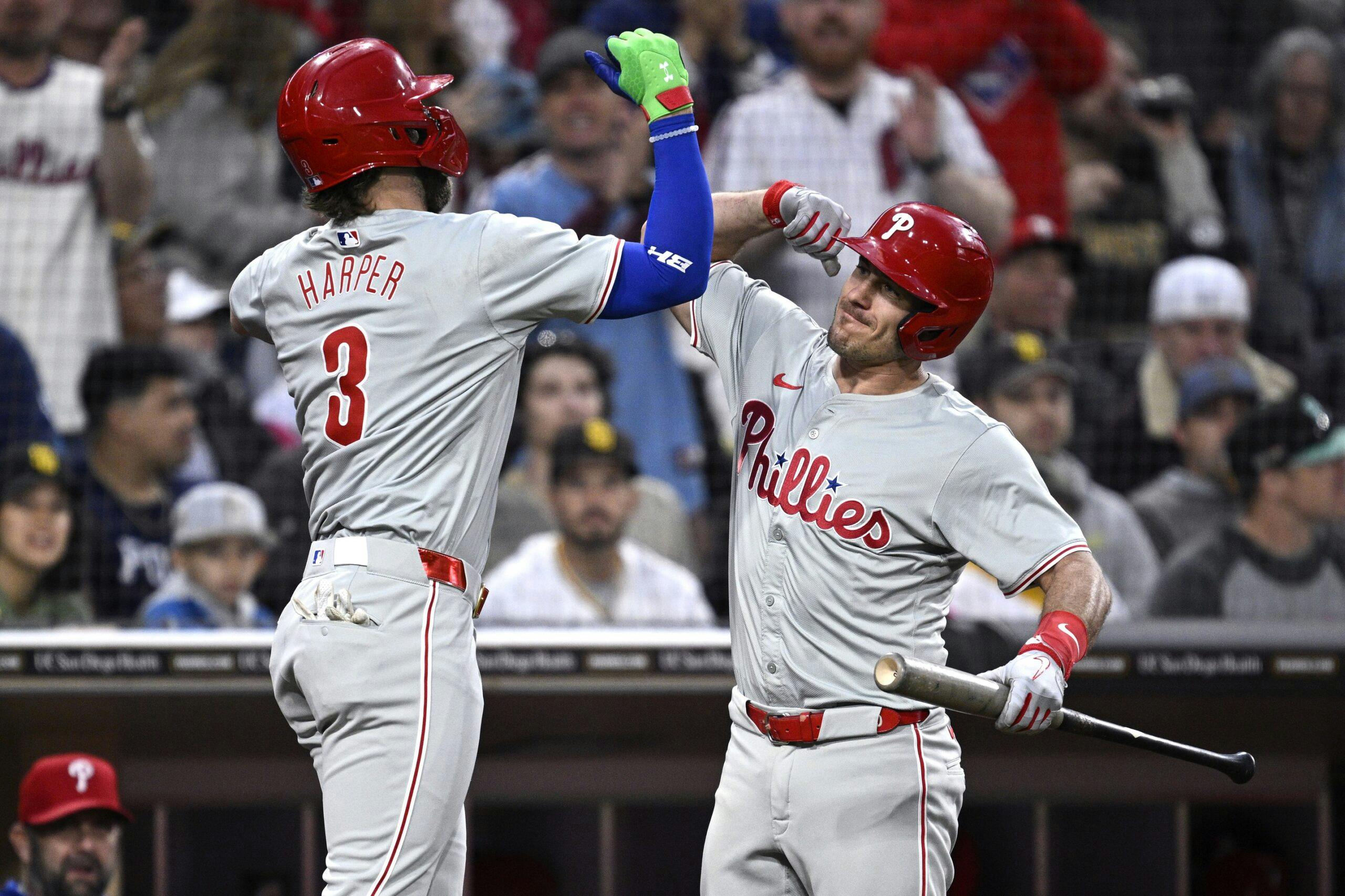 Philadelphia Phillies first baseman Bryce Harper (3) is congratulated by catcher J.T. Realmuto (10) after hitting a home run against the San Diego Padres during the third inning at Petco Park. Mandatory Credit: Orlando Ramirez-USA TODAY Sports