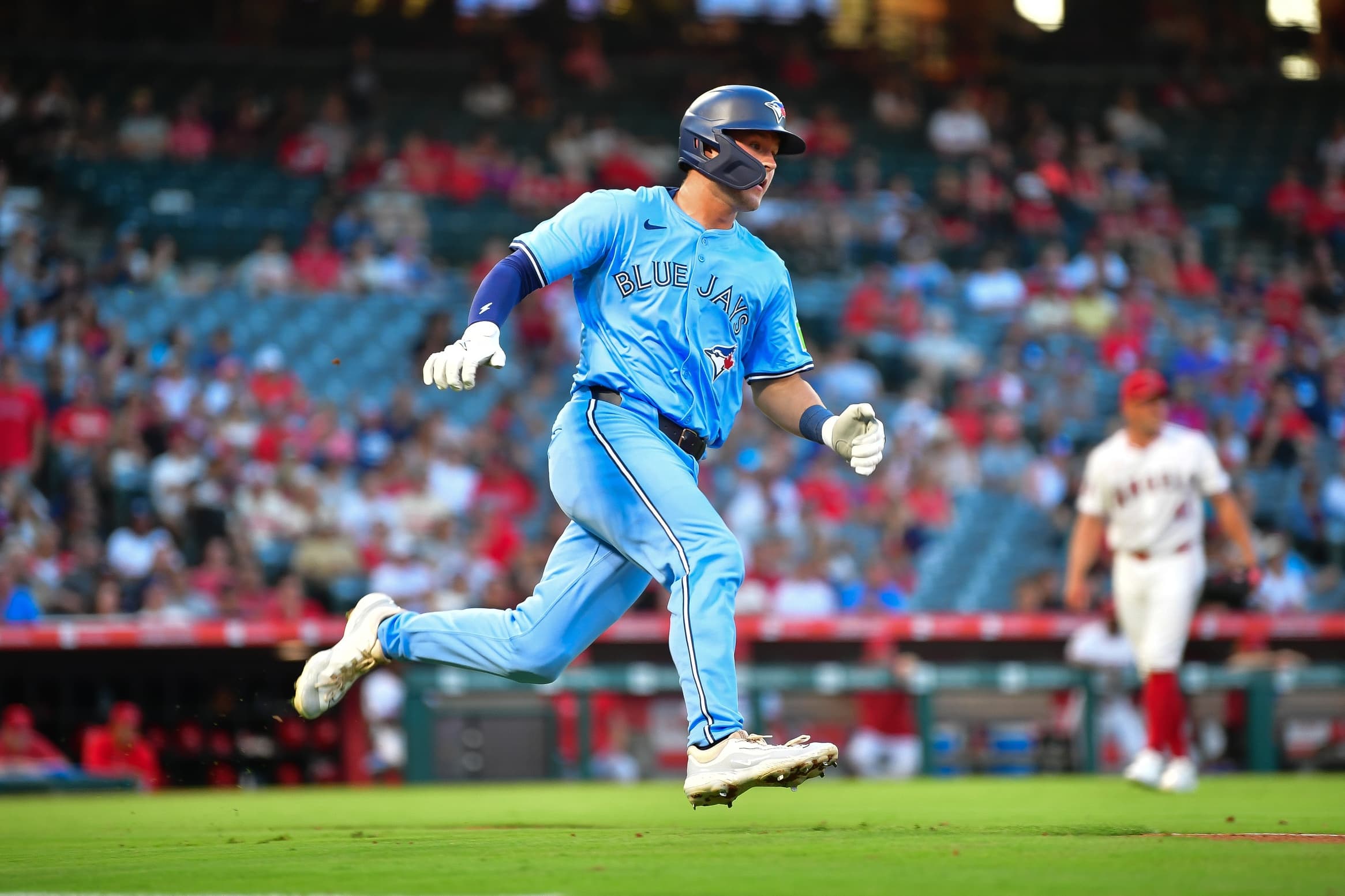 Toronto Blue Jays second baseman Will Wagner (7) runs after hitting a double against the Los Angeles Angels during the third inning at Angel Stadium.