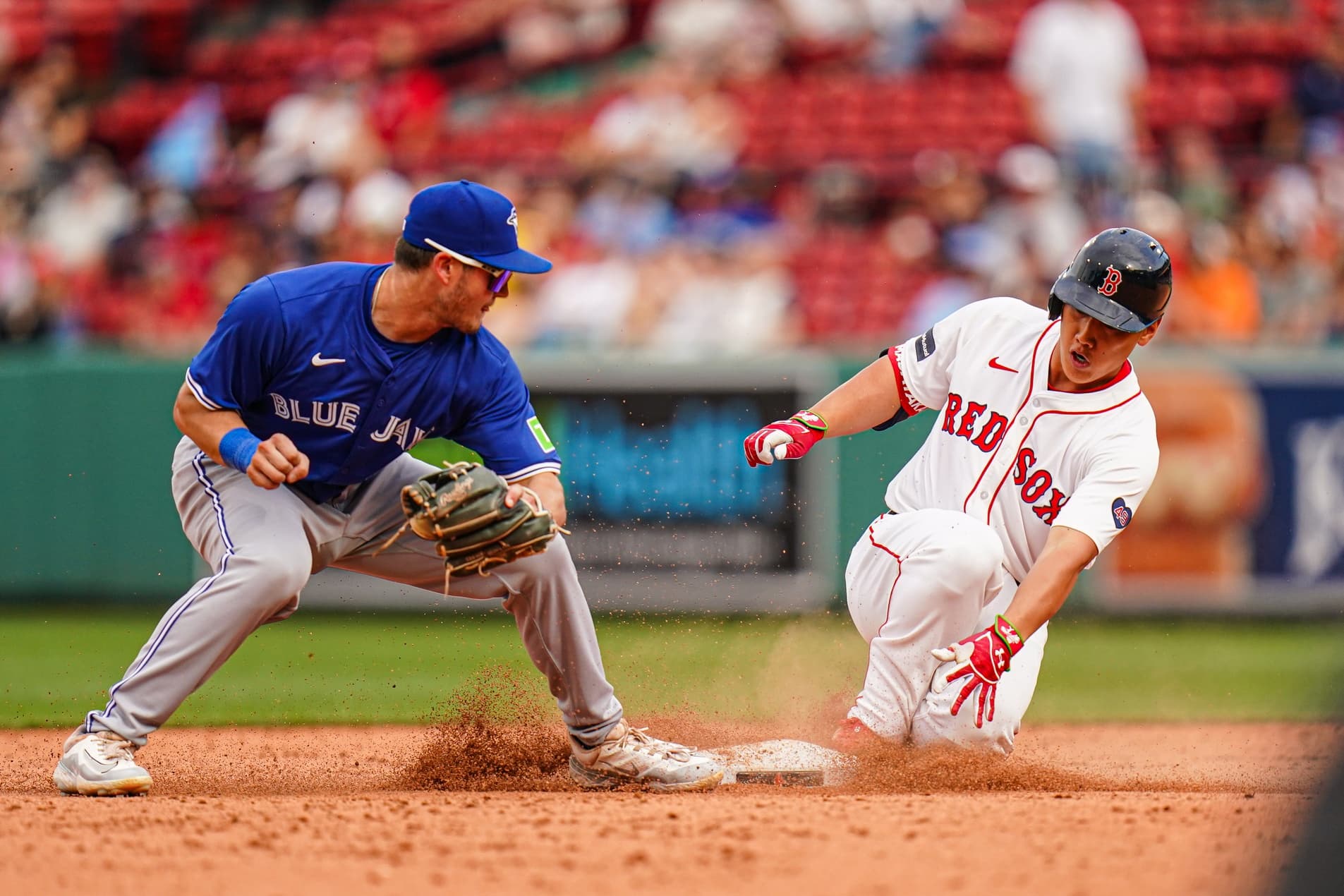Boston, Massachusetts, USA; Boston Red Sox designated hitter Masataka Yoshida (7) hits a double against the Toronto Blue Jays in the ninth inning at Fenway Park.