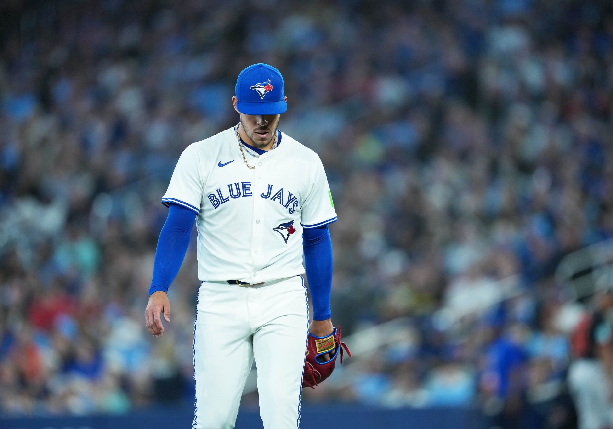 Toronto Blue Jays starting pitcher Jose Berrios (17) walks towards the dugout against the Baltimore Orioles during the second inning at Rogers Centre