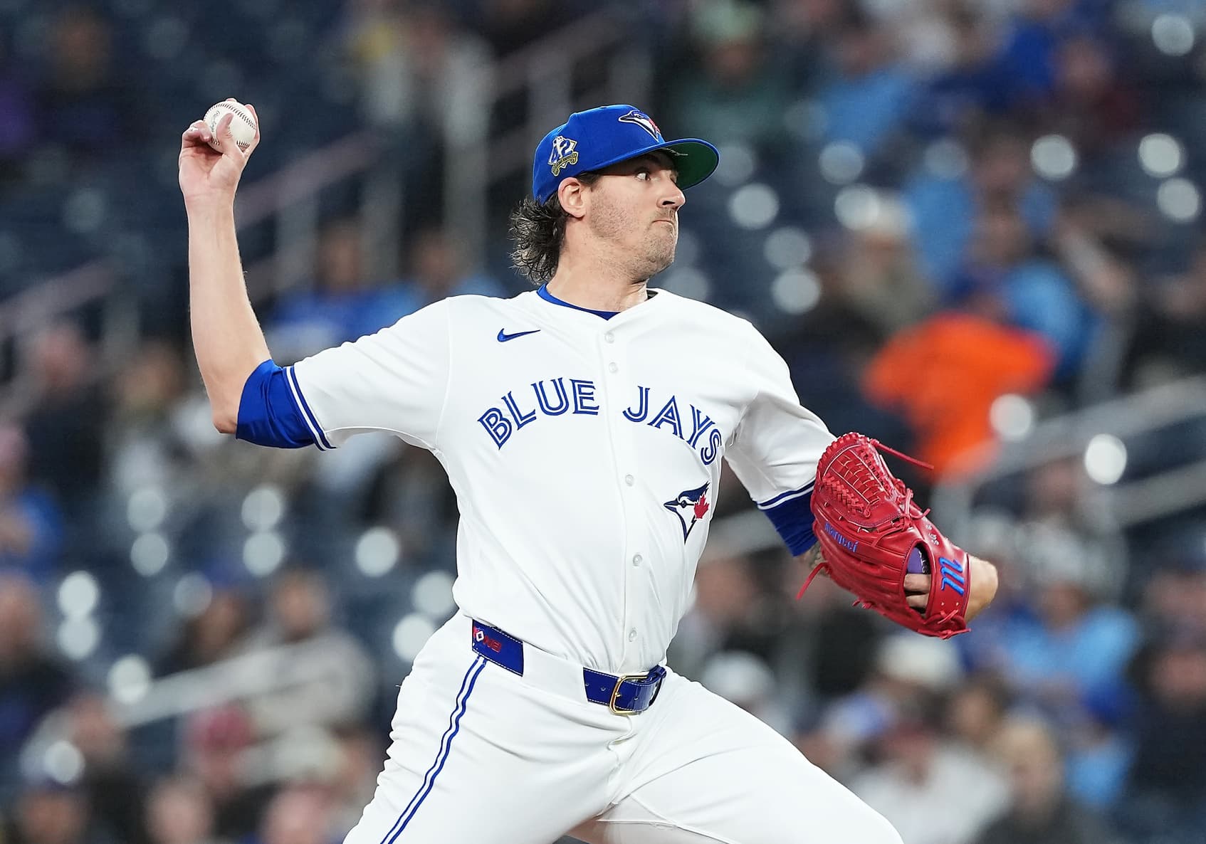 Toronto Blue Jays starting pitcher Kevin Gausman (34) throws a pitch against the Atlanta Braves during the first inning at Rogers Centre.