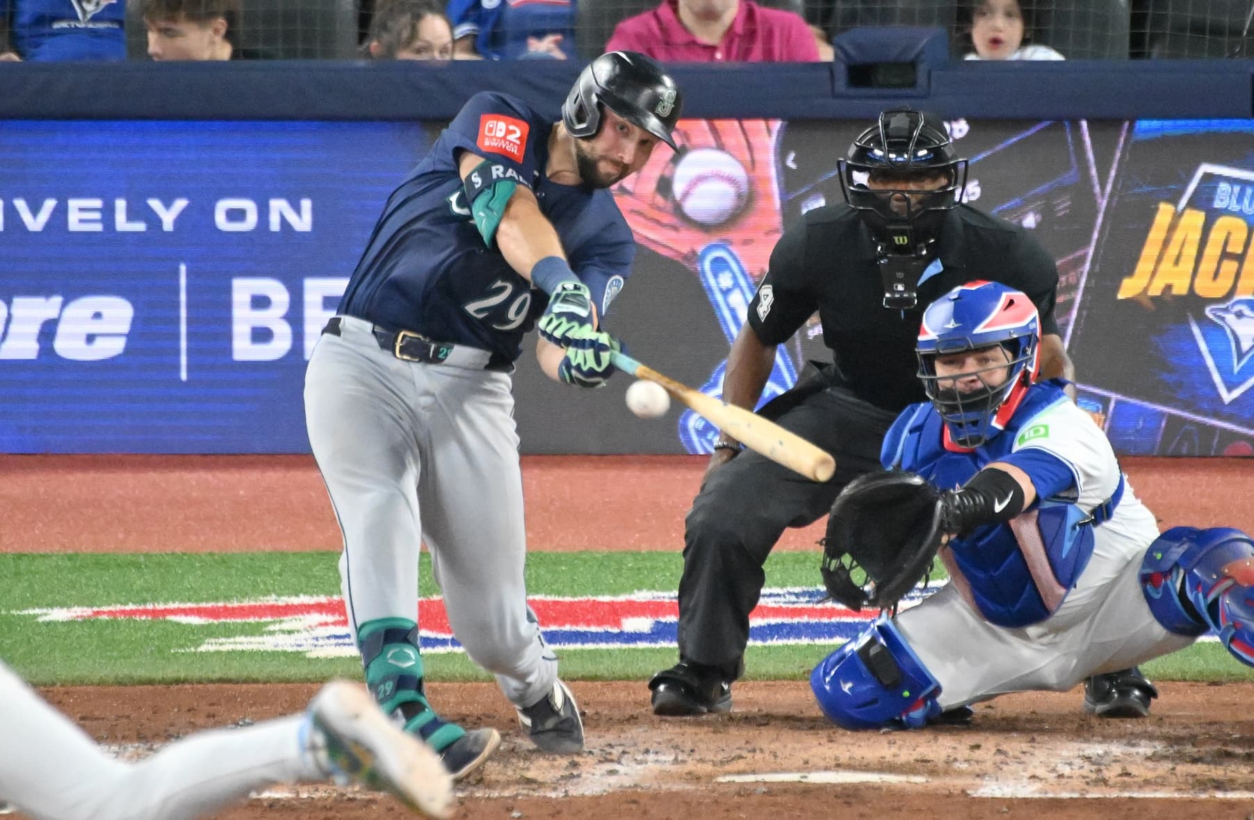 Seattle Mariners catcher Cal Raleigh (29) hits a double against the Toronto Blue Jays in the fifth inning at Rogers Centre.