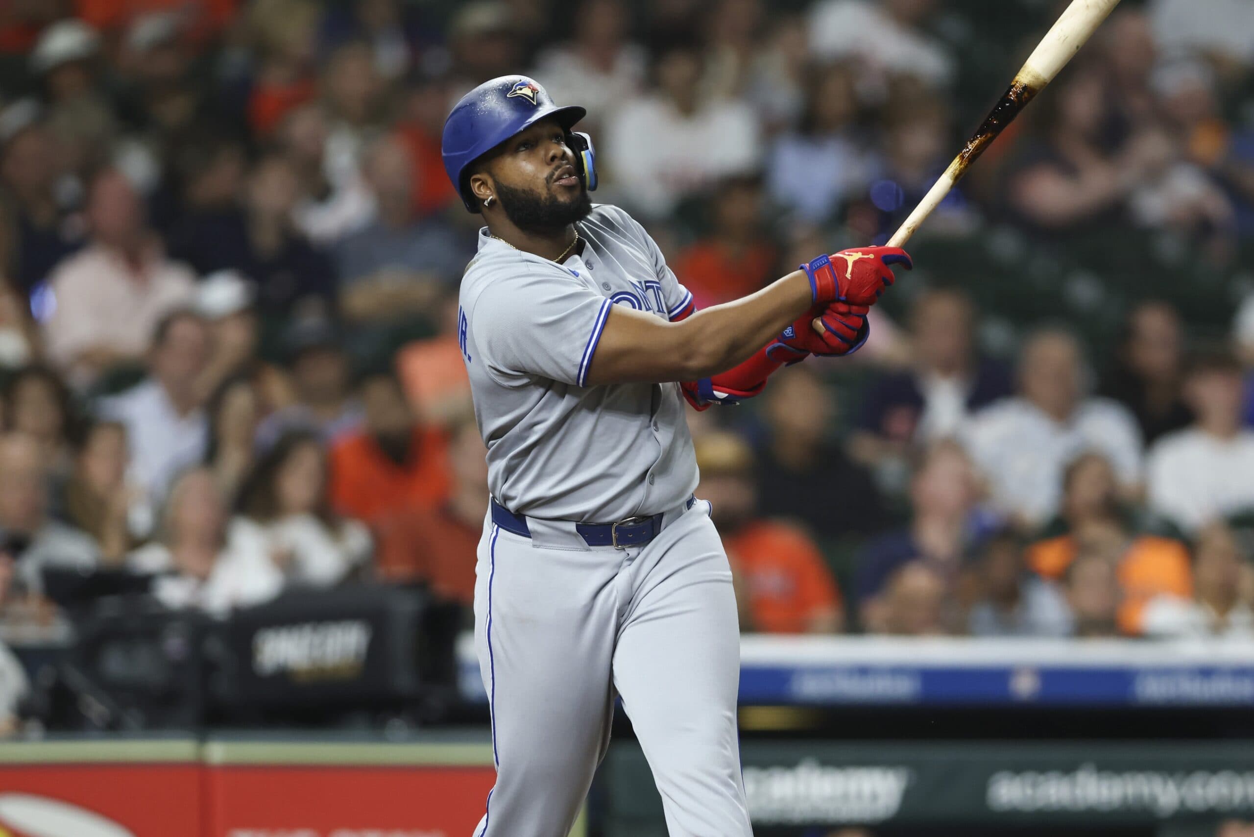 Toronto Blue Jays designated hitter Vladimir Guerrero Jr. (27) bats during the sixth inning against the Houston Astros at Daikin Park.