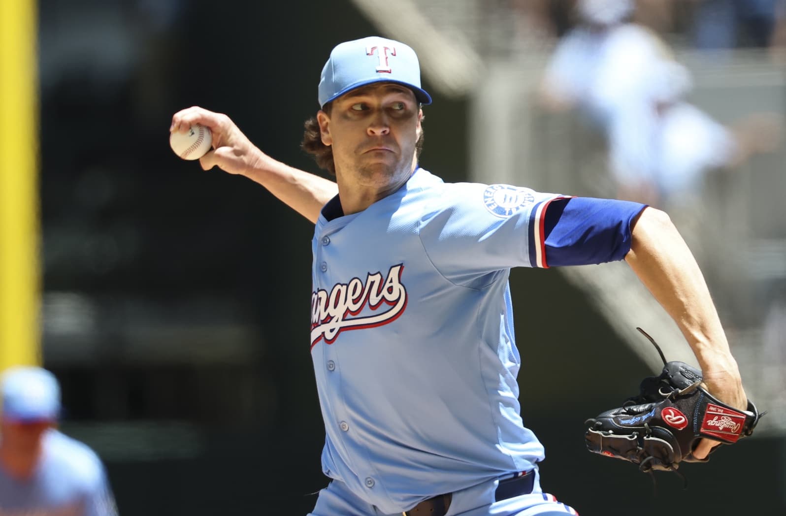 Texas Rangers starting pitcher Jacob deGrom (48) throws during the first inning against the Seattle Mariners at Globe Life Field.
