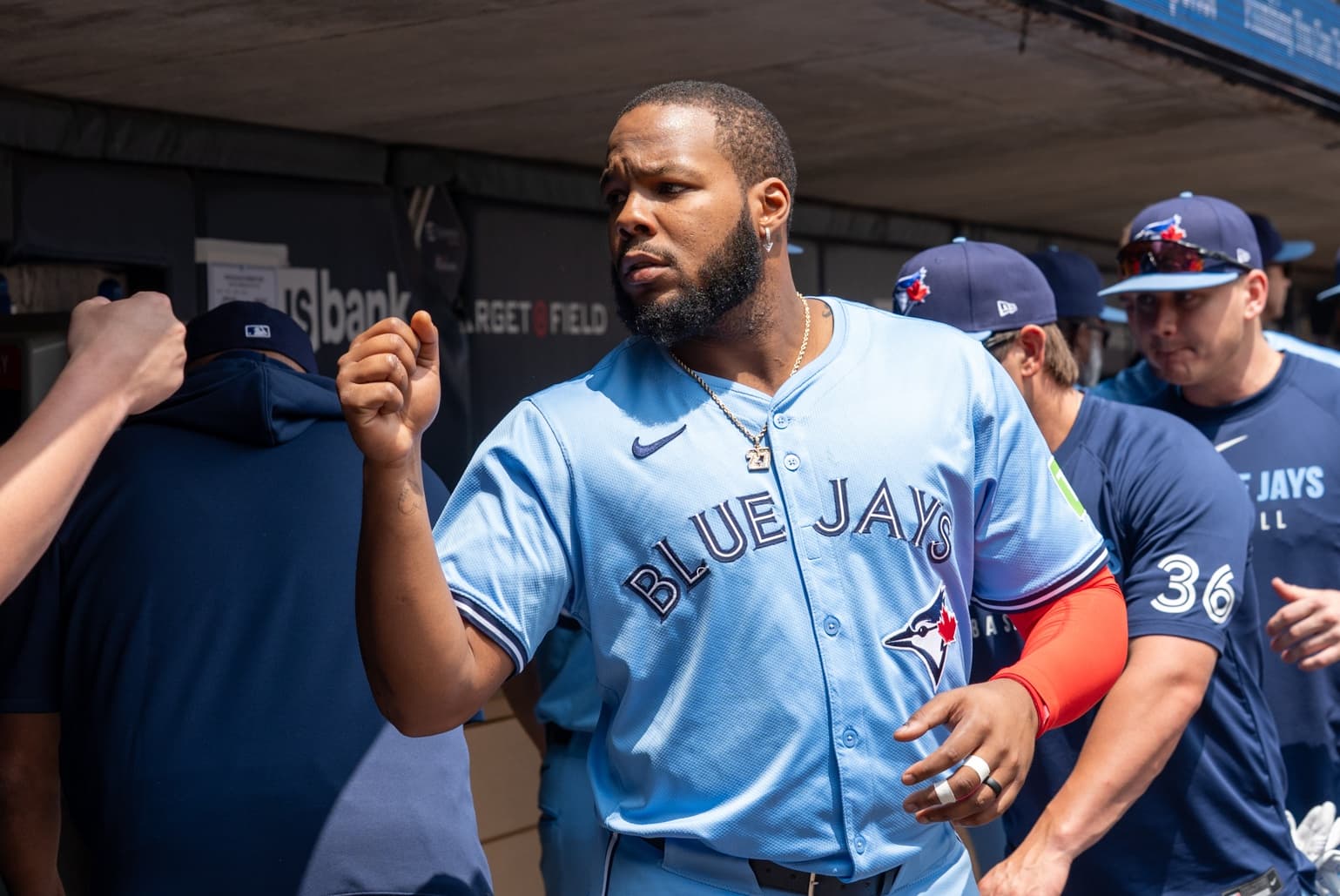 Toronto Blue Jays first base Vladimir Guerrero Jr. (27) greets teammates before their game against the Minnesota Twins at Target Field.
