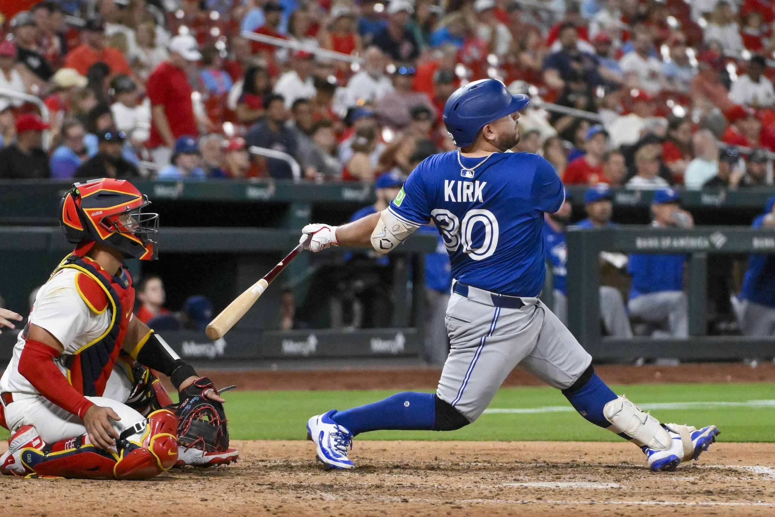 Toronto Blue Jays catcher Alejandro Kirk (30) hits a solo home run against the St. Louis Cardinals during the eighth inning at Busch Stadium.