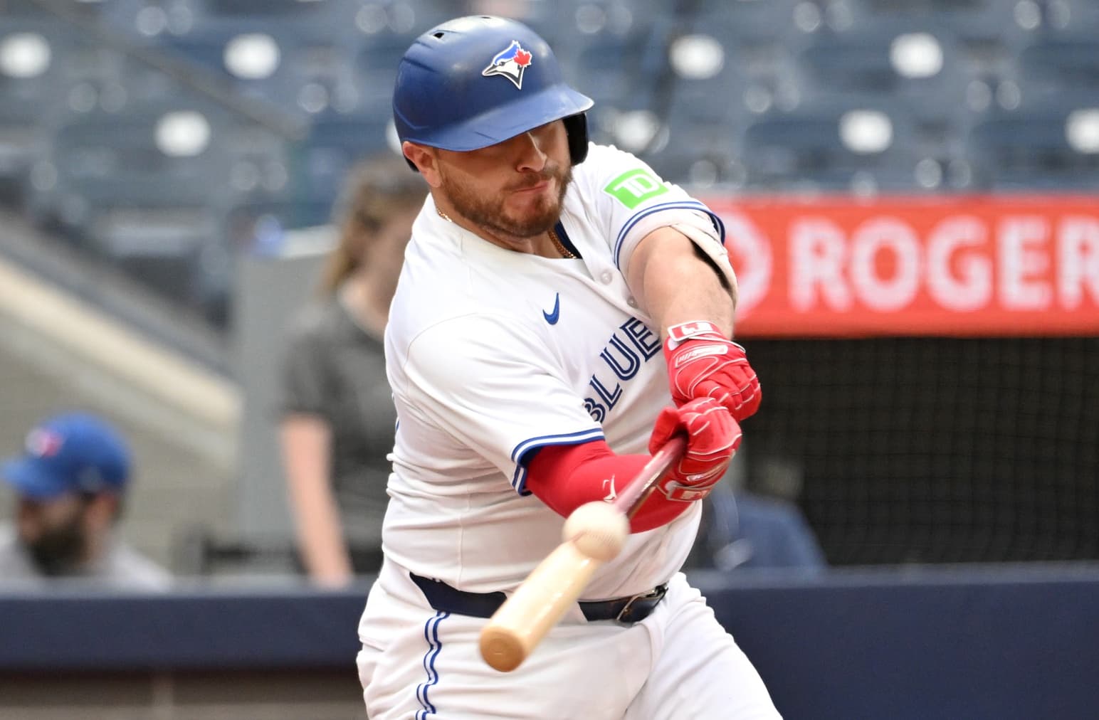 ; Toronto Blue Jays catcher Alejandro Kirk (30) hits a solo home run against the Arizona Diamondbacks in the eighth inning at Rogers Centre.