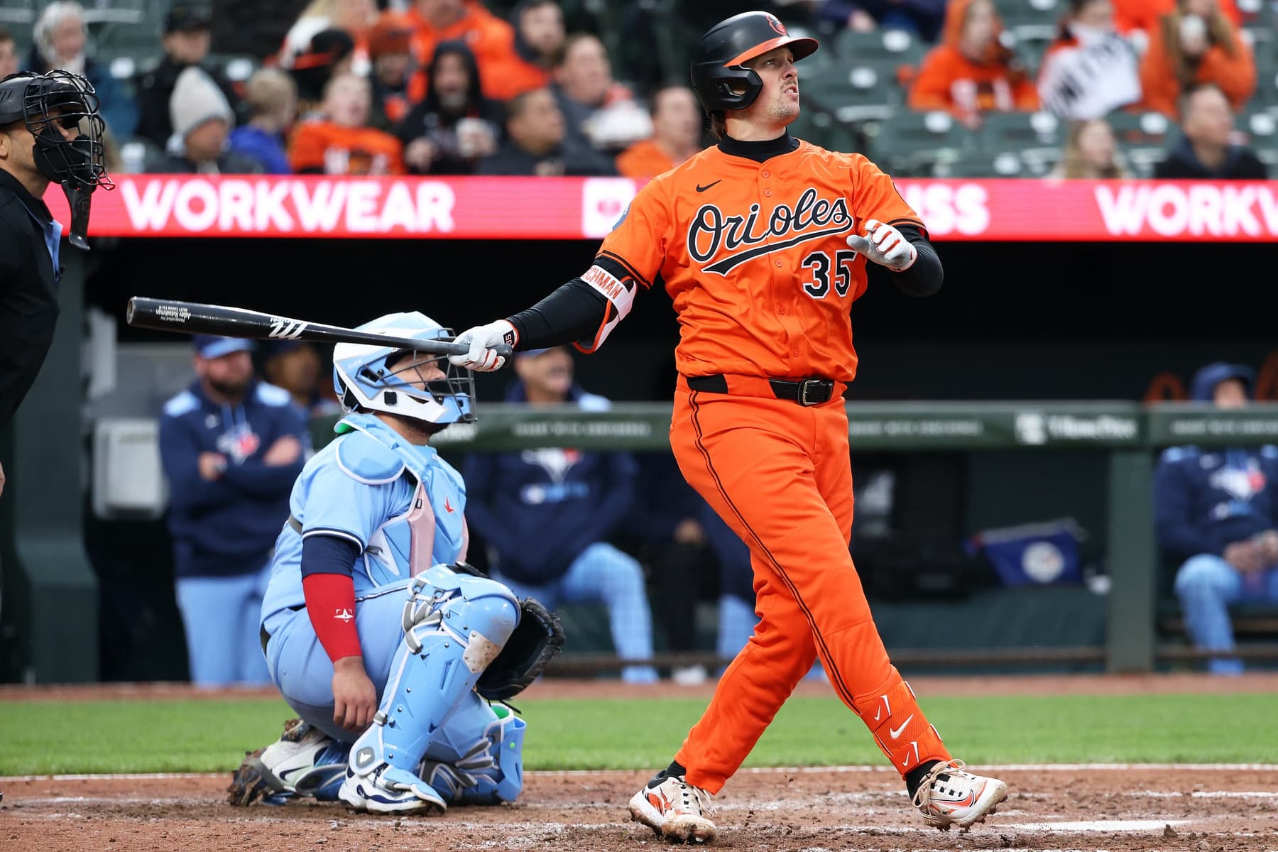 Baltimore Orioles catcher Adley Rutschman (35) hits a home run during the sixth inning against the Toronto Blue Jays at Oriole Park at Camden Yards.