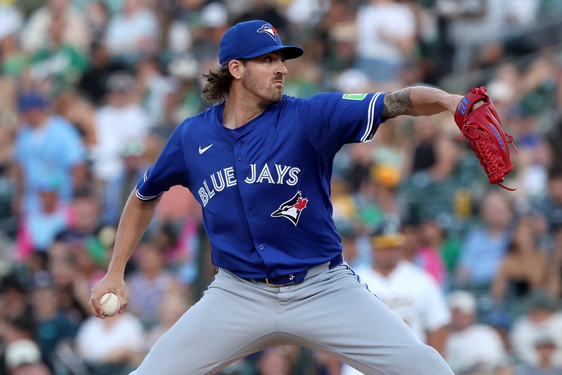 Toronto Blue Jays starting pitcher Kevin Gausman (34) throws a pitch against the Athletics during the second inning at Sutter Health Park.