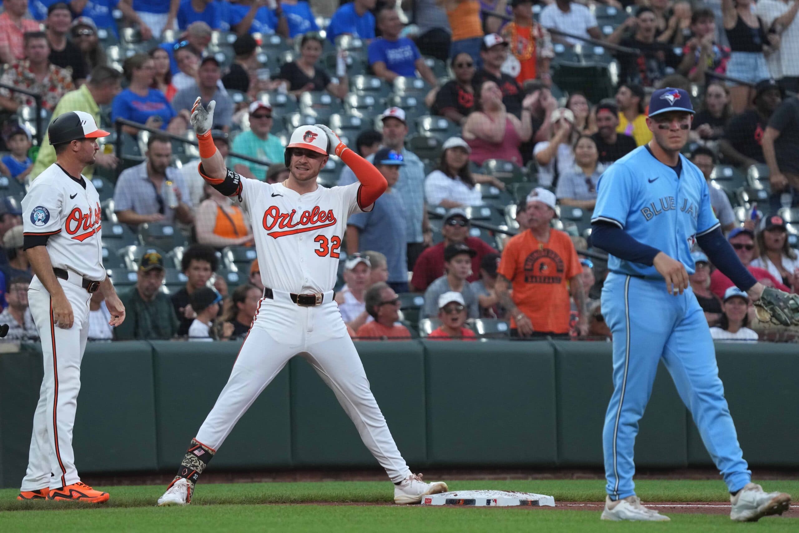Baltimore Orioles outfielder Ryan O’Hearn (32) gestures following his run-scoring triple during the fourth inning against the Toronto Blue Jays at Oriole Park at Camden Yards.