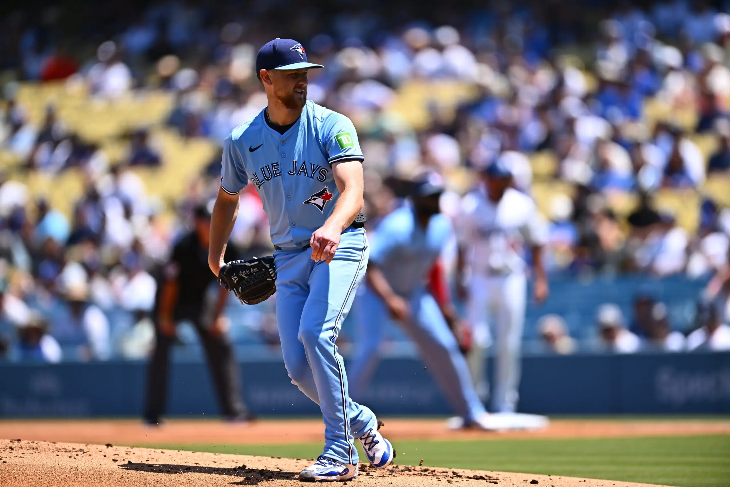 Toronto Blue Jays starting pitcher Eric Lauer (56) follows through on a pitch during the first inning against the Los Angeles Dodgers at Dodger Stadium.
