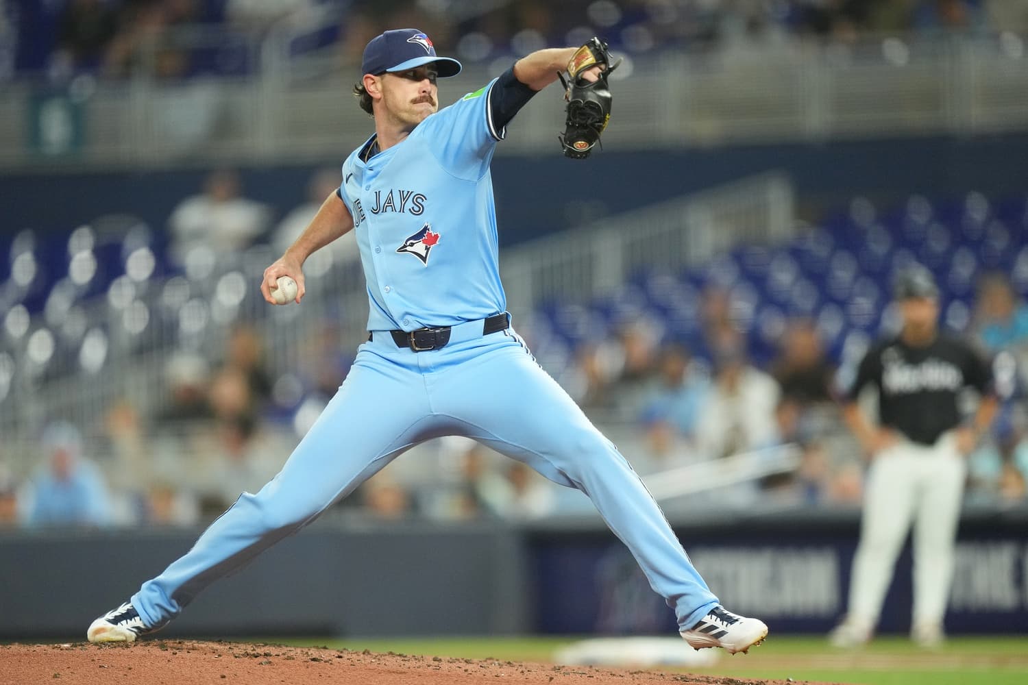 Toronto Blue Jays starting pitcher Shane Bieber (57) throws a pitch against the Miami Marlins at loanDepot Park.