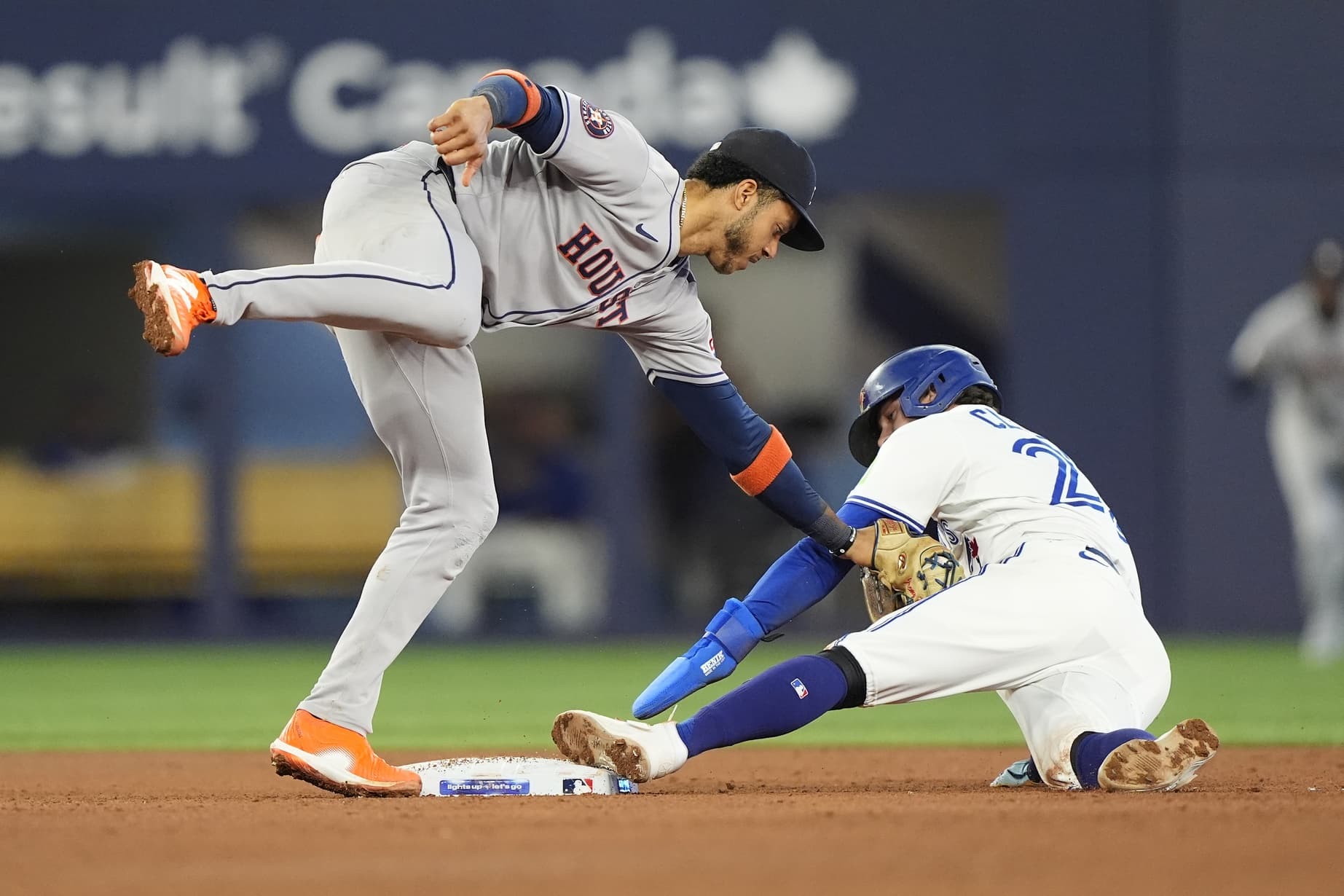 Houston Astros shortstop Jeremy Pena (3) gets Toronto Blue Jays shortstop Ernie Clement (22) out trying to steal second base during the fifth inning at Rogers Centre.