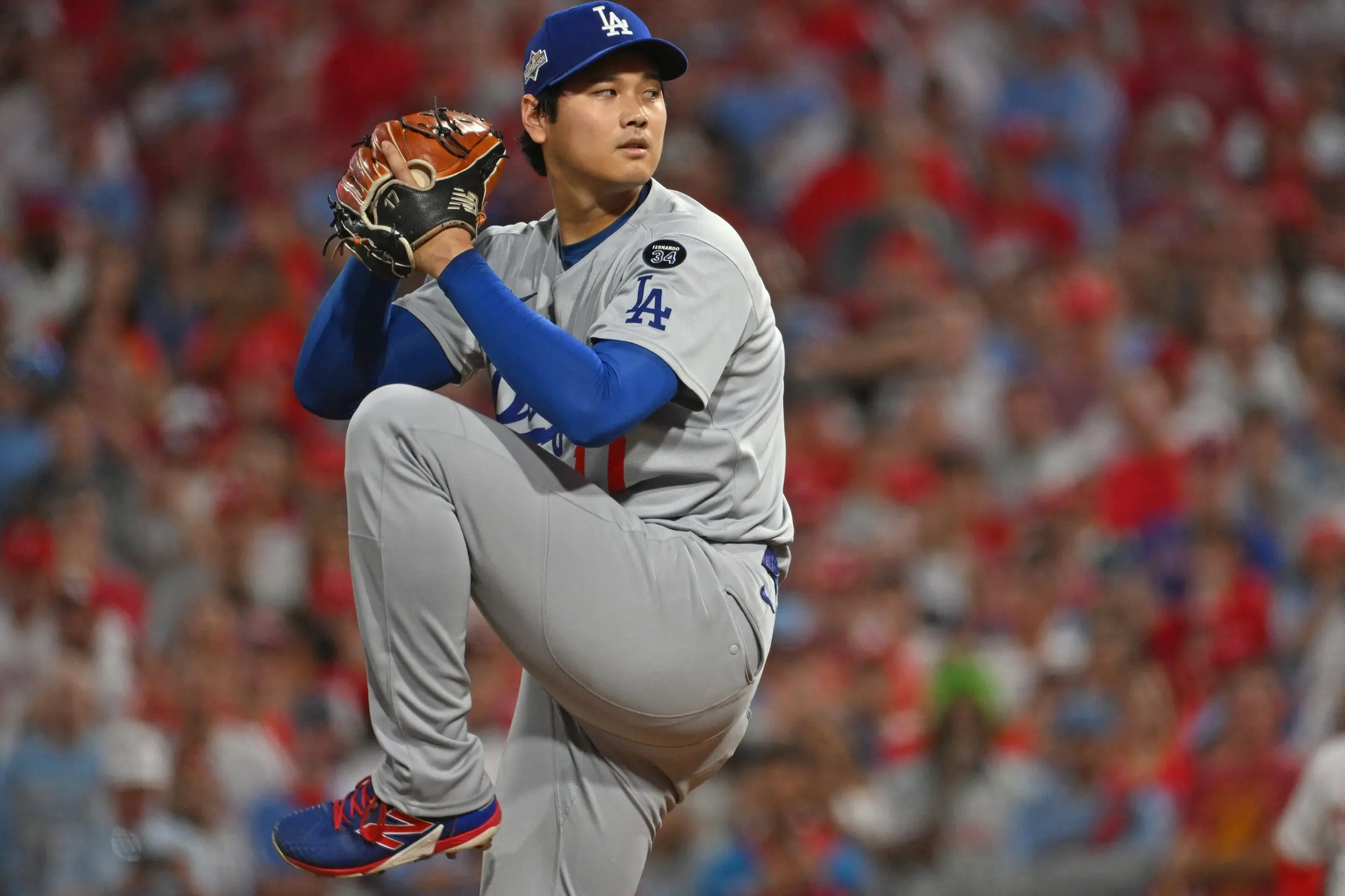 Los Angeles Dodgers two-way player Shohei Ohtani (17) throws a pitch during the first inning against the Philadelphia Phillies during game one of the NLDS round for the 2025 MLB playoffs at Citizens Bank Park.