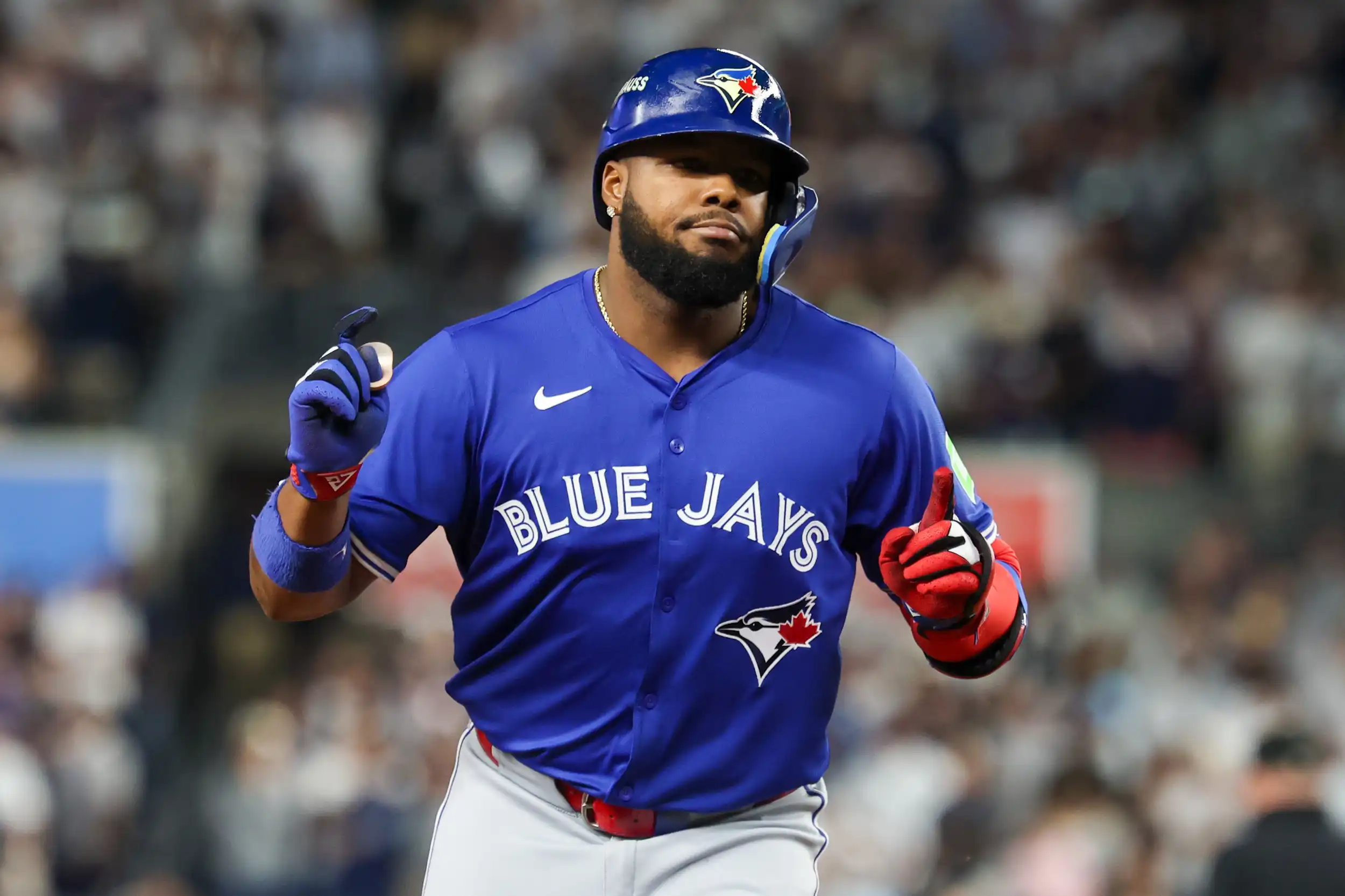 Toronto Blue Jays first baseman Vladimir Guerrero Jr. (27) reacts after hitting a two-run home run in the first inning against the New York Yankees during game three of the ALDS round for the 2025 MLB playoffs at Yankee Stadium