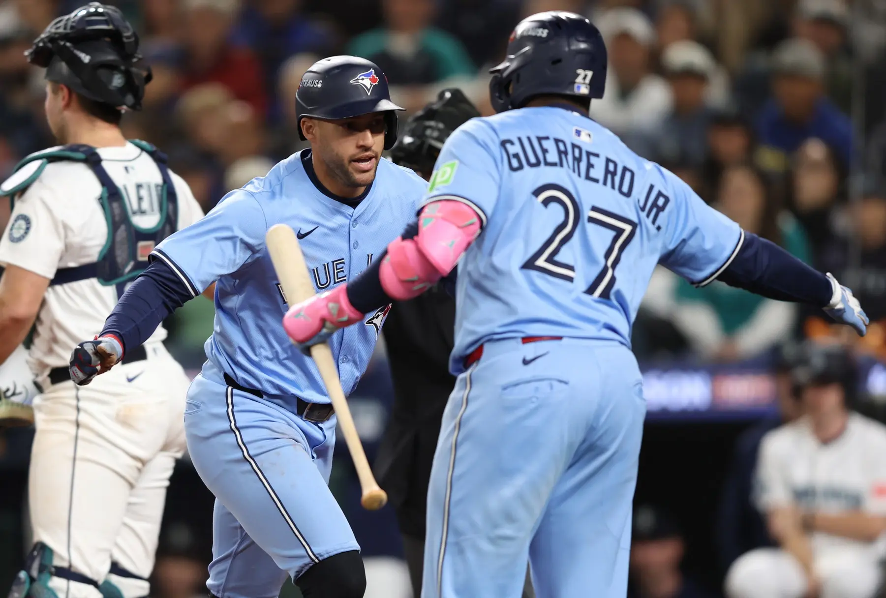 Toronto Blue Jays designated hitter George Springer (4) scores after a wild pitch in the fourth inning against the Seattle Mariners during game four of the ALCS round for the 2025 MLB playoffs at T-Mobile Park.