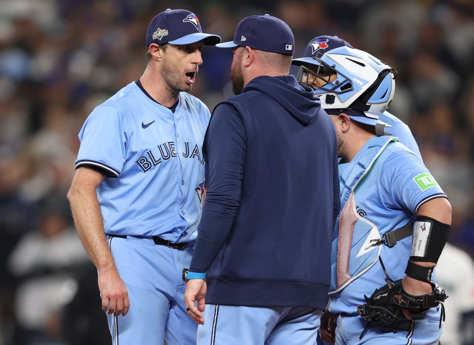 Toronto Blue Jays pitcher Max Scherzer (31) talks to manager John Schneider (14) in the fifth inning against the Seattle Mariners during game four of the ALCS round for the 2025 MLB playoffs at T-Mobile Park